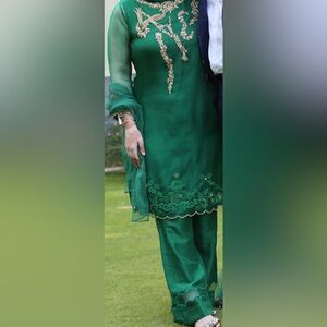 Emerald green silk shalwar kameez (3 pc) with zardosi work on top